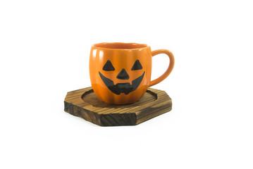 cup orange on wood