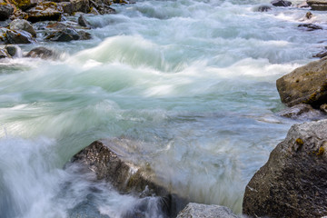 Majestic mountain river in Canada. Long exposure water.