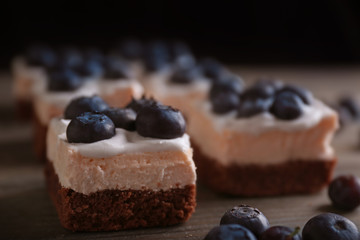Delicious cakes with blueberries, closeup
