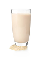 Glass of sesame milk isolated on white