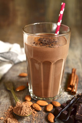 Homemade chocolate banana smoothie in a glass.