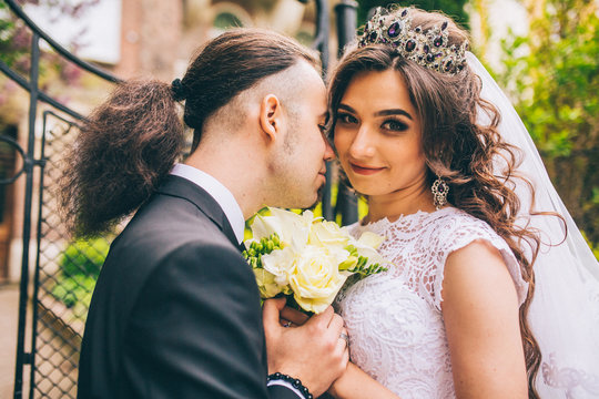 Beautiful Couple of Lovers Hugging, a Young Woman with Wedding Hairstyle  and Luxury Jewelry and Handsome Brutal Man in Stock Image - Image of  outdoors, girl: 145945129