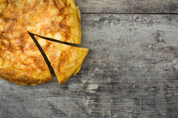 Traditional spanish omelette on wooden table

