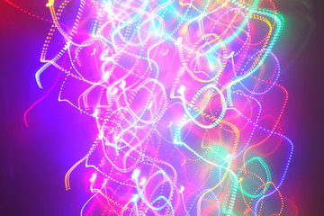 Chaotic lights in moriol blur out of focus - abstract photograph background.