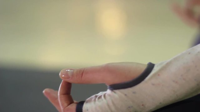 Women attractive fingers in Lotus Position