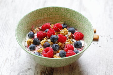 Fresh fruit with muesli and yogurt