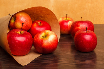 Thanksgiving day: Heap of apples in the paper packet