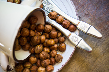 Hazelnuts on the rustic background