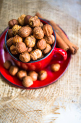 Hazelnuts on the rustic background