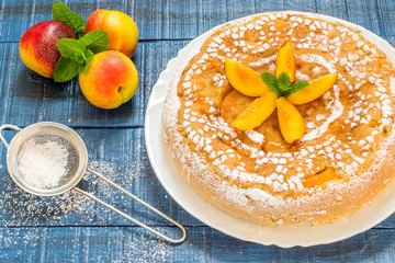 Delicious homemade cake with nectarines