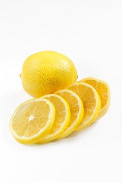 Slices of fresh lemon isolated on white background