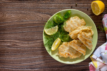 Fried fish with potato batter - healthy eating, diet, top view.