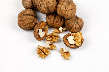 Whole walnuts and kernels on the table