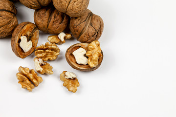 Whole walnuts and kernels on the table