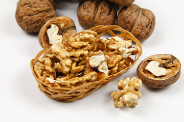 Whole walnuts and kernels on the table