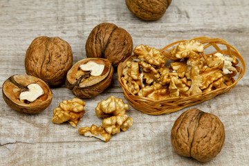 Whole walnuts and kernels on the table