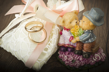 Fototapeta na wymiar Wedding Rings with Wedding Decoration on the wood