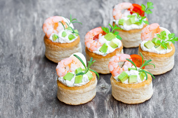 salted  puff pastry stuffed with cream cheese and prawns