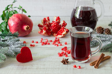 Pomegranate juice or cocktail, pomegranates, heart.