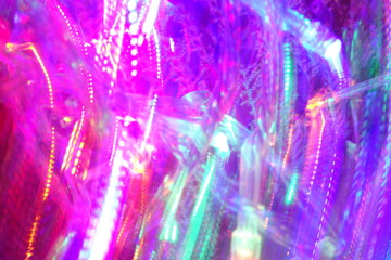 Chaotic lights in moriol blur out of focus - abstract photograph background.