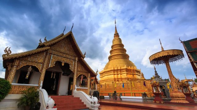 Wat Phrathat Hariphunchai Voramahvihan Landmark Temple of Lumphun, Thailand 4K Time Lapse (tilt down)