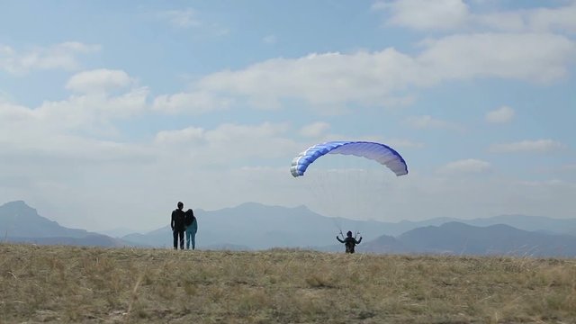 couple looking at the glider