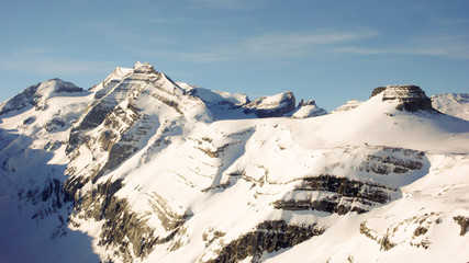 the Swiss Alps in winter with a view of Kistenstöckli and Bifertenstock