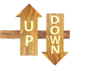 up and down text on wooden arrow in white background 