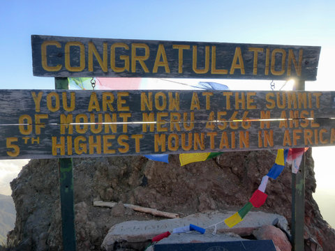 summit sign on Mount Meru in Arusha National Park