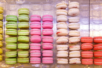 Showcases with colorful makarons