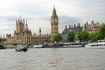 View from the River Thames in London, England of the iconic Houses of Parliament and Big Ben
