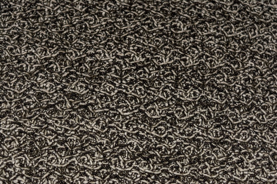 The texture of brown leather fabric from artificial wool.