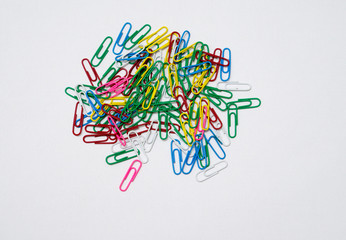 Colorful paper clips isolated in white