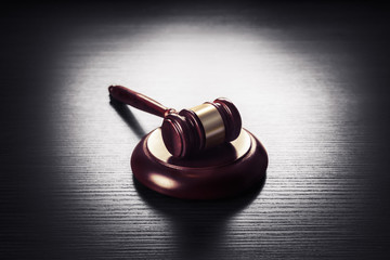 judge gavel on a black  wooden background