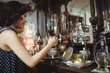 Stylish woman shopping for antiques