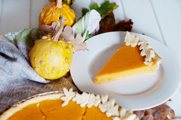 Three different kinds of decorative small pumpkins