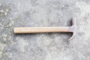 Old retro hammers on wooden workbench