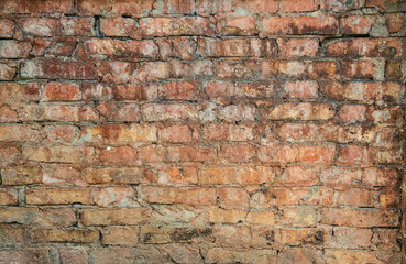 Old weathered red Brick wall. Vintage texture Background.