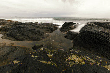 View of the rocky ocean shore