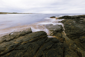 View of the rocky ocean shore