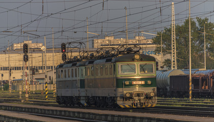 Sunrise on railway in station