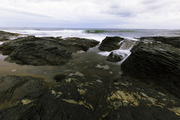 Fototapeta na wymiar View of the rocky ocean shore