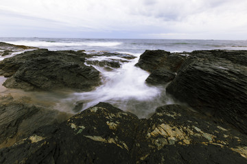 View of the rocky ocean shore