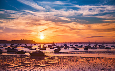 Serene sunset over boats at Sandbanks, Poole, Dorset near Bourne - obrazy, fototapety, plakaty