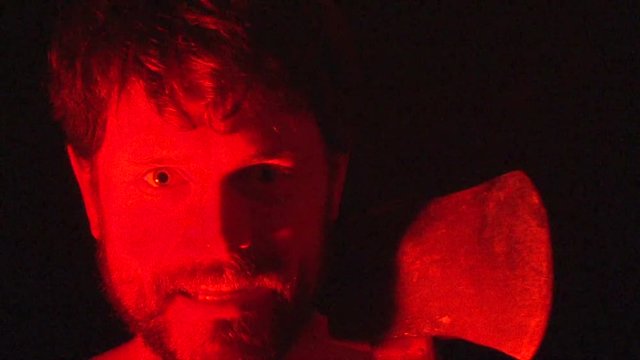 Man in red wielding a hatchet attacks!
