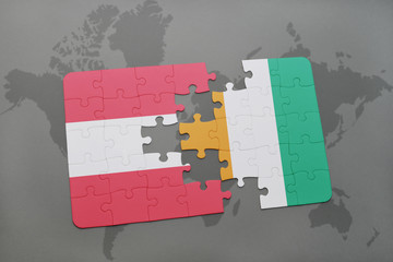 puzzle with the national flag of austria and cote divoire on a world map background.