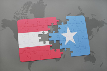 puzzle with the national flag of austria and somalia on a world map background.