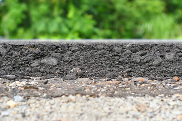 layer of asphalt raw material in a shallow dept of field