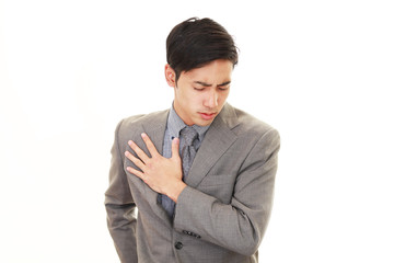 疲れた表情のビジネスマン