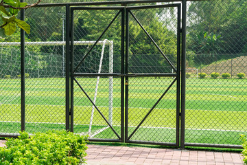 soccer field being locked with padlock